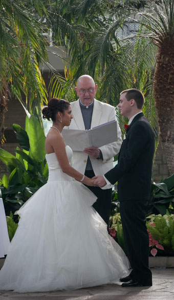Bride and Groom holding hands