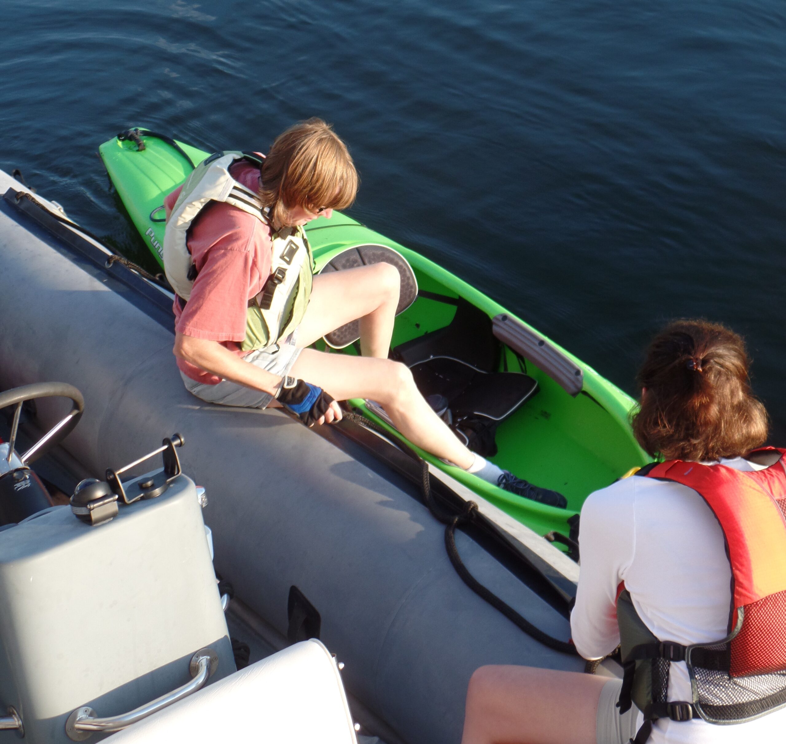 Nancy demonstrating proper kayak entry
